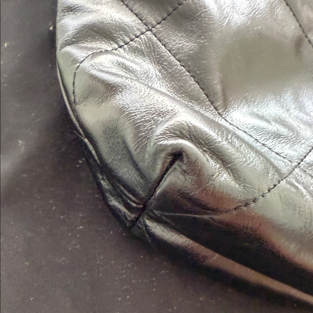 Chanel Black Quilted Shoulder Bag with Gold Accents - Picture 9 of 10